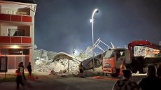 Six mort et 47 ouvriers piégés dans l'effondrement d'un immeuble en Afrique du Sud
