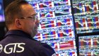 Wall Street hésite, entre tensions commerciales et baisses des taux