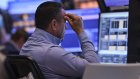 Wall Street ouvre en baisse après la perte du triple A de la dette américaine