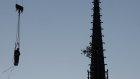 Réinstallation d'une première statue de la flèche de Notre-Dame
