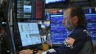 Wall Street en hausse, continue de guetter les évolutions au Moyen-Orient