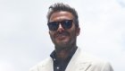 Loin des terrains de foot, Beckham une icône mondiale