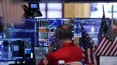 Wall Street termine sans direction claire, fait une pause avant la Fed