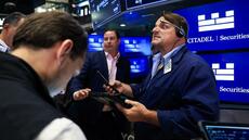 Wall Street termine en ordre dispersé, entre Fed et taux élevés
